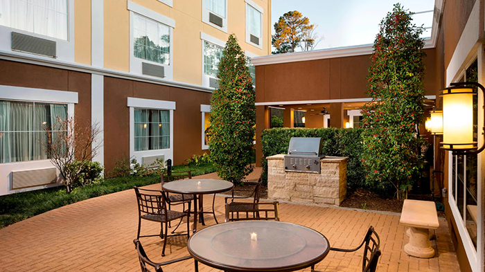 An outdoor common area at the Fairfield Inn & Suites Houston Intercontinental Airport hotel in Houston, Texas.