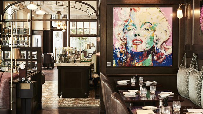 One of the restaurants at the Four Seasons Hotel Gresham Palace Budapest where there hangs an impressionist painting of actress and model Marilyn Monroe.