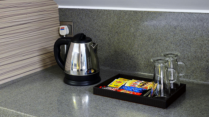 Self-serve coffee available in a guest room at the Bliss Hotel Singapore.