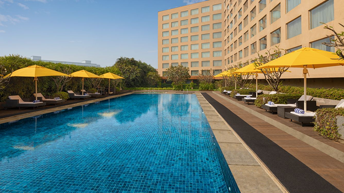 The Courtyard by Marriott Mumbai International Airport hotel pool. The tiles under the water give it a striking sapphire blue color.