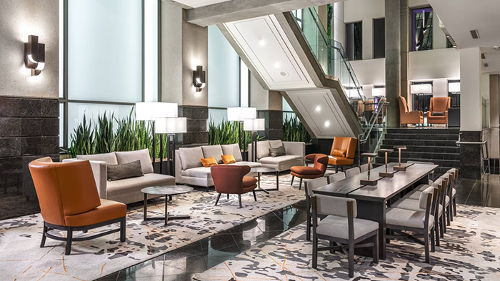 The Delta Hotels by Marriott Vancouver Downtown Suites lobby. There's an abundance of seating available.