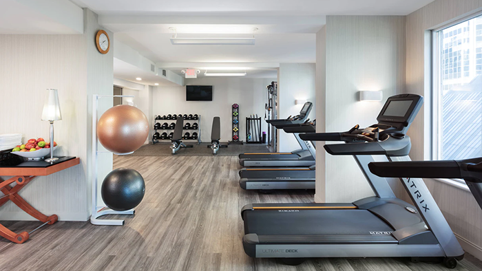 The Delta Hotels by Marriott Vancouver Downtown Suites fitness center. A bowl of apples is available for guests to enjoy in between workouts.