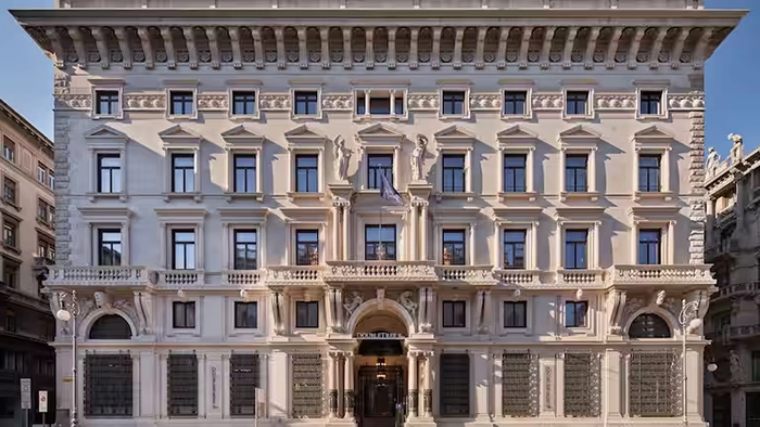 An exterior shot of the DoubleTree by Hilton Trieste. The building features a classic Italian facade.
