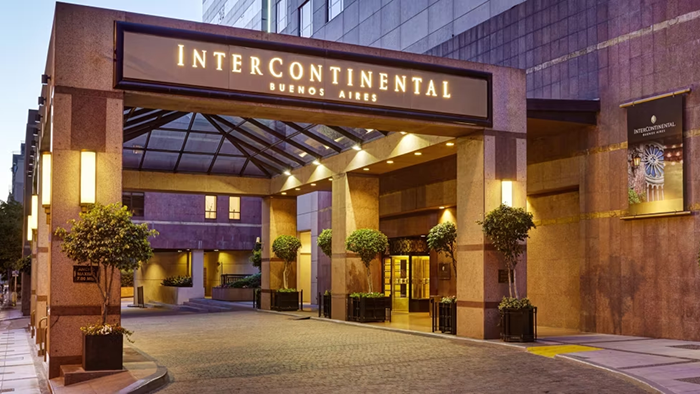 The main entrance to InterContinental Buenos Aires, an IHG Hotel photographed at dusk.