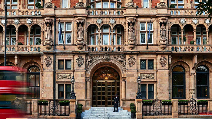 An exterior shot of the legendary Kimpton Fitzroy London Hotel. The building's facade features several beautiful sculptures.