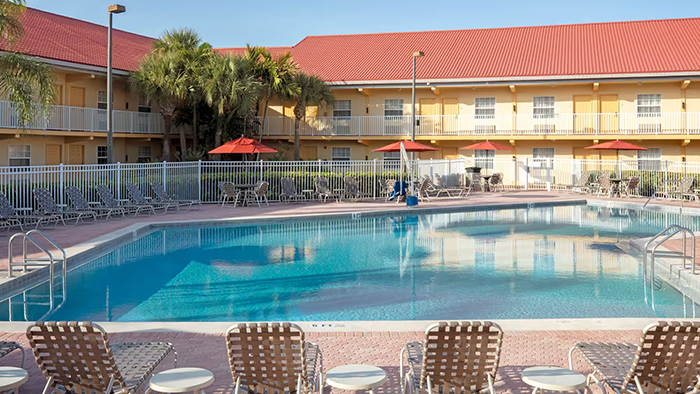 The pool area at the La Quinta Inn by Wyndham Cocoa Beach-Port Canaveral.