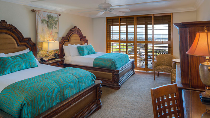 A guest room at the Pacific Terrace Hotel. This one features what looks to be two double beds.