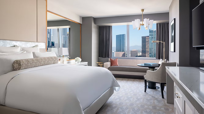 A guest room at The Ritz-Carlton, Los Angeles. It's decorated quited subtly, with almost exclusively neutral colors.