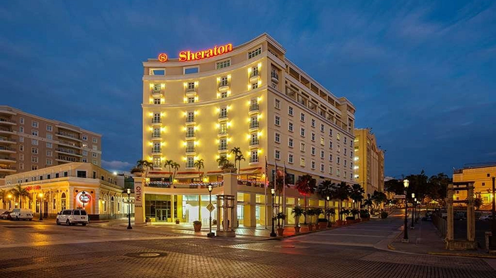 An exterior shot of the Hotel Rumbao, a Tribute Portfolio Hotel. This image was taken prior to the hotel's rebrand, when it was still known as the Sheraton Old San Juan Hotel.