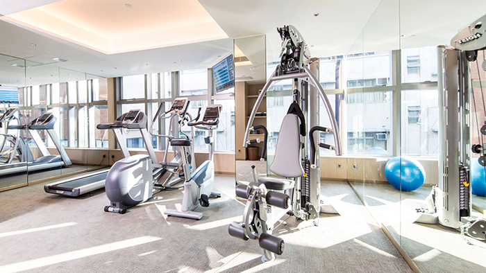 The Hotel Stage's fitness center. The mirrors on the right side of the room make it appear larger than it actually is.