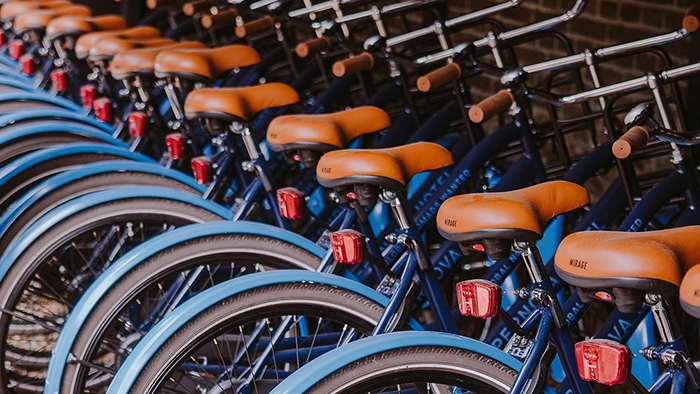 A row of bicycles available for use by guests of the Supernova Hotel.
